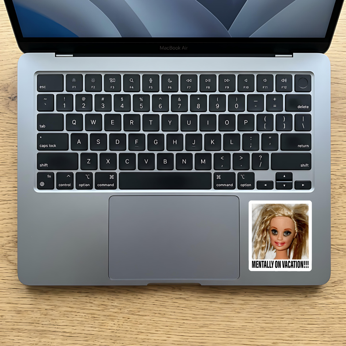 Sarcastic vacation humor sticker for a work laptop