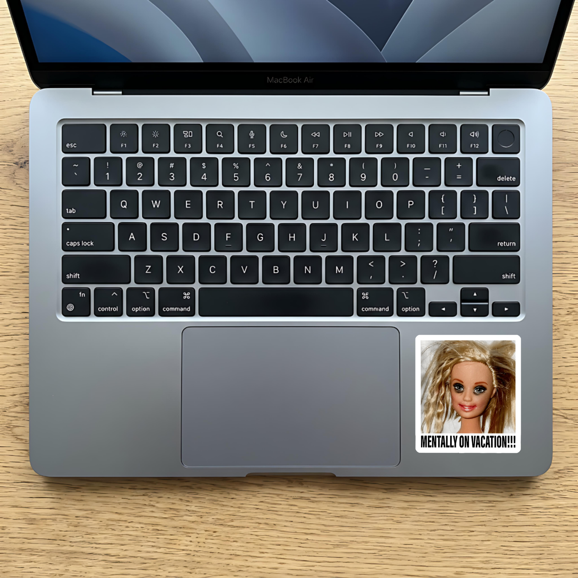Sarcastic vacation humor sticker for a work laptop