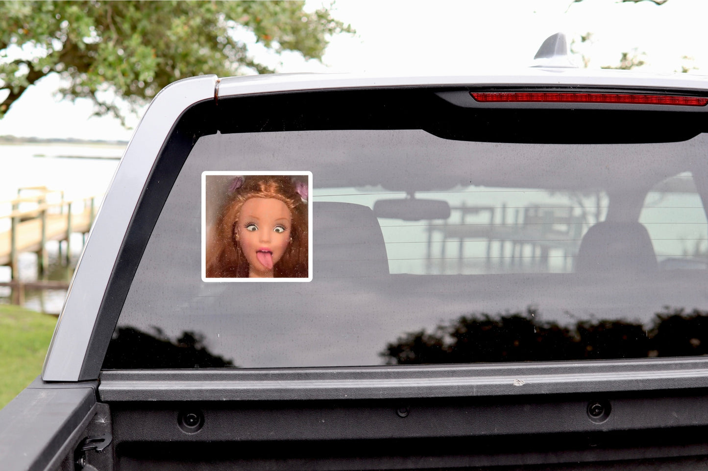 Expressive doll face laptop sticker